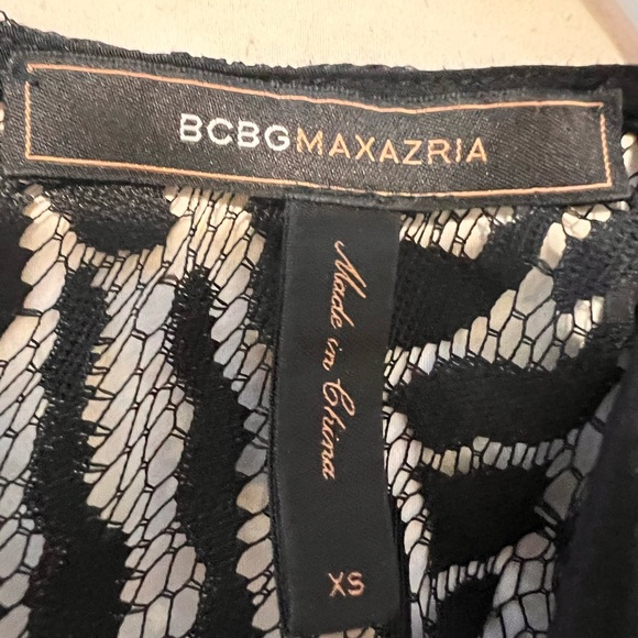 Sexy & Sophisticated BCBGMaxAzria Black Lace Detail Jumpsuit with Pockets - Picture 8 of 10